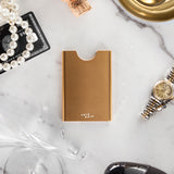 Champagne colour Thin King credit card case  with a black Amex