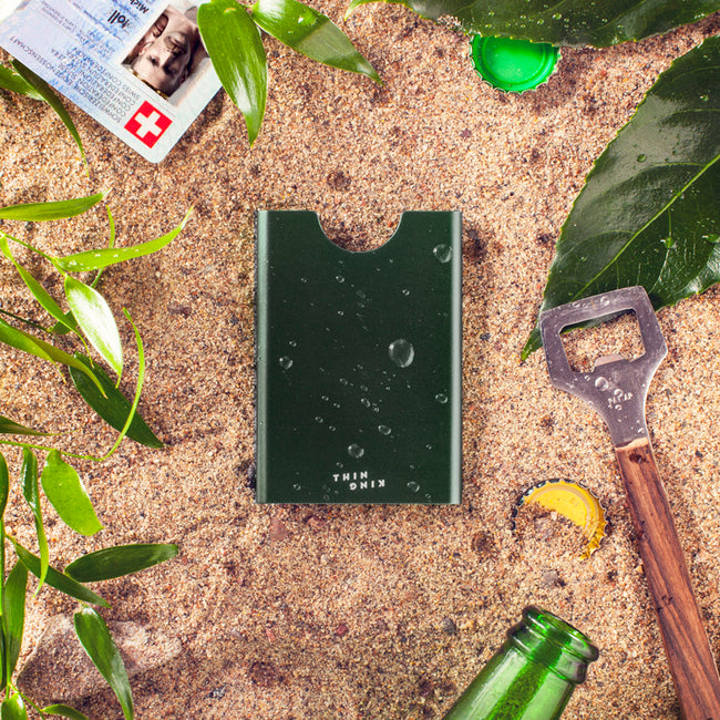 Pine Tree Thin King credit card case on a sandy beach 