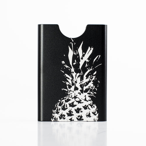 Thin King aluminum credit card case with laser engraved pineapple graphic